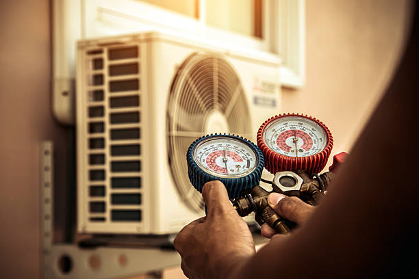 Professional Ductwork Repair technician working in Cambridge, MA